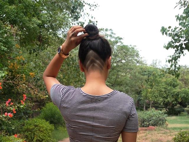 People in Delhi are rocking undercut tattoos. Here Mita Singh, a 27-year-old advertising executive is flaunting it above her nape.