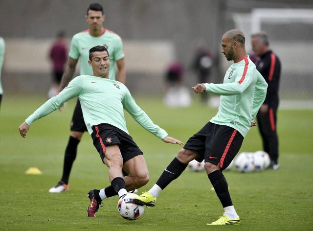 Portugal's Cristiano Ronaldo (left) exercises with Ricardo Quaresma in Marcoussis, near Paris. (AP Photo) Portugal's Cristiano Ronaldo (left) exercises with Ricardo Quaresma in Marcoussis, near Paris. (AP Photo)