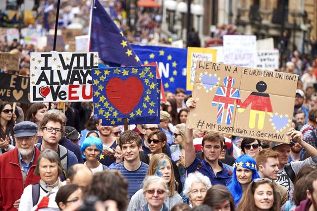 People hold up pro-Europe placards and European flags as thousands of protesters take part in a March for Europe, in London earlier in July to protest against Britain's vote to leave the EU, which has plunged the government into political turmoil and left the country deeply polarised. (AFP) People hold up pro-Europe placards and European flags as thousands of protesters take part in a March for Europe, in London earlier in July to protest against Britain's vote to leave the EU, which has plunged the government into political turmoil and left the country deeply polarised. (AFP)