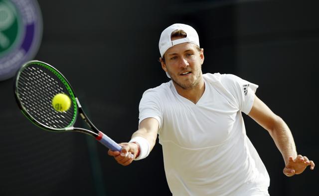 Pouille had never won a match on grass before his run to the quarterfinals this year. (AP) Pouille had never won a match on grass before his run to the quarterfinals this year. (AP)