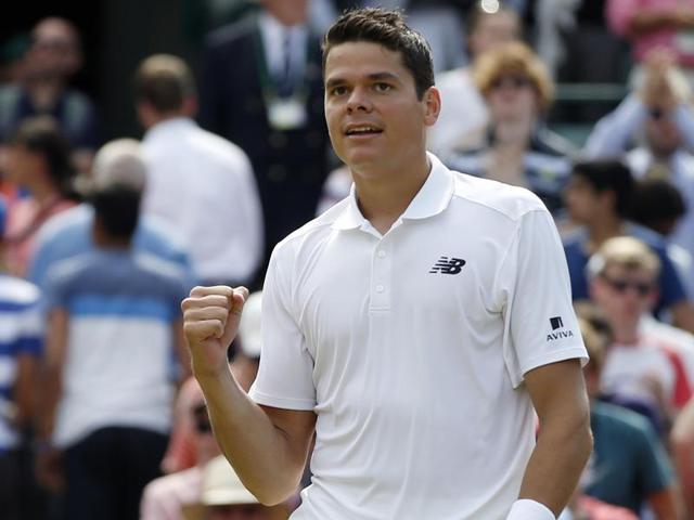 Milos Raonic shakes hands with Sam Querrey at the net after the match. (AP) Milos Raonic shakes hands with Sam Querrey at the net after the match. (AP)