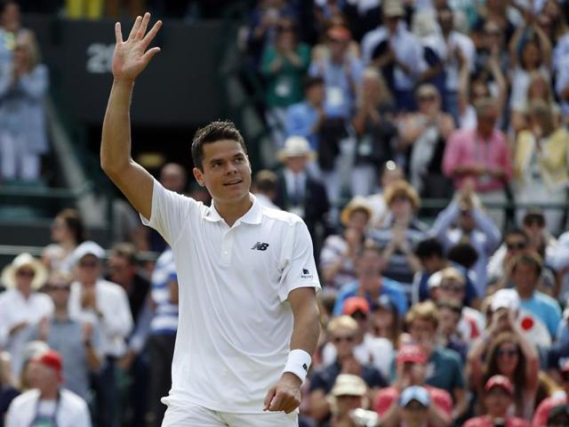 Milos Raonic of Canada celebrates after beating Sam Querrey of the US in their men's singles quarterfinal. (AP)