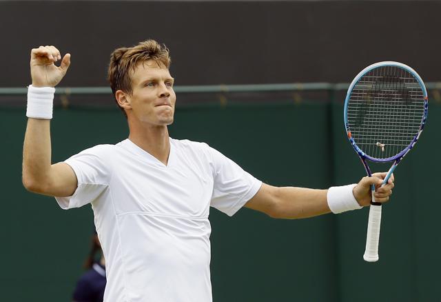 Tomas Berdych of the Czech Republic celebrates after beating Jiri Vesely in their men's singles match on day nine of the Wimbledon Tennis Championships in London. (AP Photo) Tomas Berdych of the Czech Republic celebrates after beating Jiri Vesely in their men's singles match on day nine of the Wimbledon Tennis Championships in London. (AP Photo)