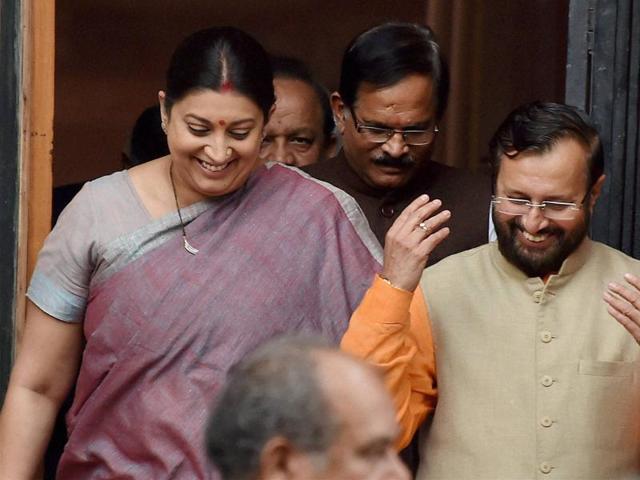 HRD Minister Smriti Irani with new Cabinet minister Prakash Javadekar after a Cabinet meeting at South Block in New Delhi on Tuesday. (PTI) HRD Minister Smriti Irani with new Cabinet minister Prakash Javadekar after a Cabinet meeting at South Block in New Delhi on Tuesday. (PTI)