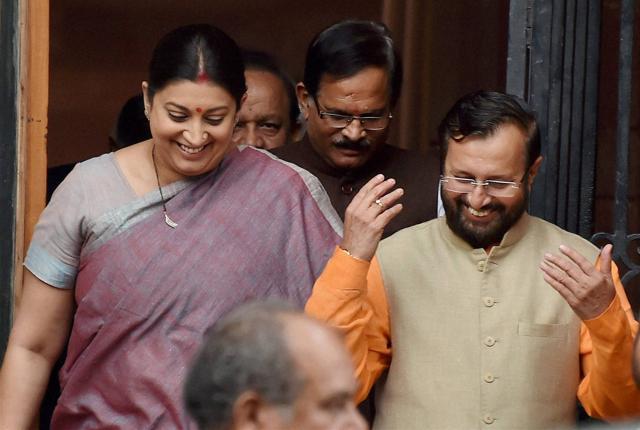 Union minister Smriti Irani with HRD minister Prakash Javadekar after a Cabinet meeting at South Block in New Delhi on Tuesday. (PTI Photo) Union minister Smriti Irani with HRD minister Prakash Javadekar after a Cabinet meeting at South Block in New Delhi on Tuesday. (PTI Photo)
