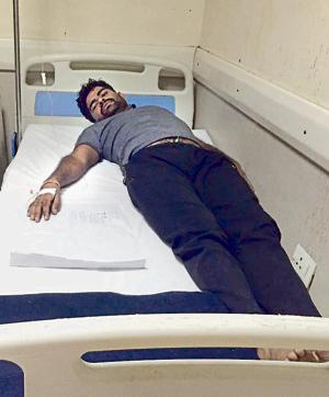 Neeraj Pradhan was admitted to hospital on Sunday. He said the police ‘lathicharged’ protesting villagers of Chithera village in Dadri. Neeraj Pradhan was admitted to hospital on Sunday. He said the police ‘lathicharged’ protesting villagers of Chithera village in Dadri.