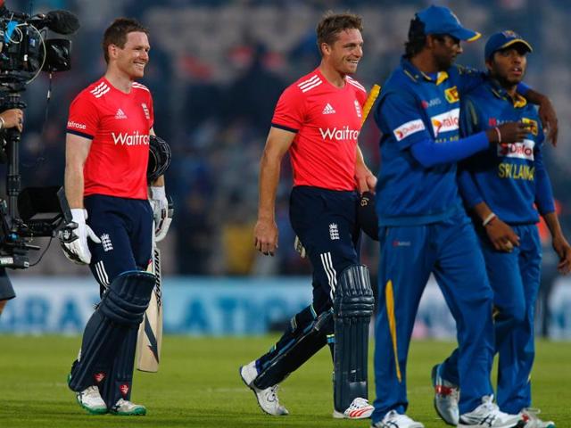 England's Captain Eoin Morgan (left) and Jos Buttler leave the field after England win the game by 8 wickets in the T20 international cricket match between England and Sri Lanka at The Ageas Bowl in Southampton, on the south coast of England. (AFP Photo) England's Captain Eoin Morgan (left) and Jos Buttler leave the field after England win the game by 8 wickets in the T20 international cricket match between England and Sri Lanka at The Ageas Bowl in Southampton, on the south coast of England. (AFP Photo)