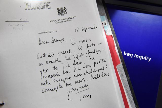 Detail of a declassified handwritten letter sent by the then British Prime Minister Tony Blair, to George Bush, former President of the United States, is seen as part of the Iraq Inquiry Report presented by Sir John Chilcot at the Queen Elizabeth II Centre in Westminster, In London, Britain July 6, 2016. (Reuters Photo)
