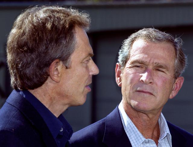 This file photo shows US president George W Bush looking at British prime minister Tony Blair. (AFP Photo) This file photo shows US president George W Bush looking at British prime minister Tony Blair. (AFP Photo)