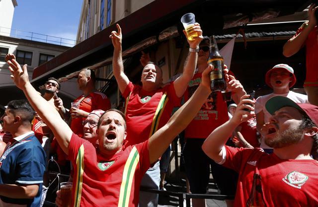 Wales fans gather ahead of their semi-final match in Lyon, France. (Reuters Photo) Wales fans gather ahead of their semi-final match in Lyon, France. (Reuters Photo)