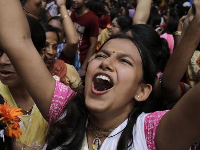 A devotee dances during the Rath Yatra in Kolkata. (Bikas Das/AP)