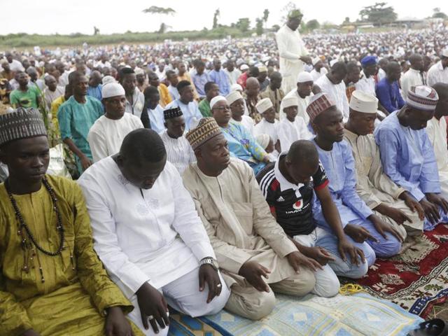 Nigeria Muslims attend the Eid al-Fitr prayers as Muslims around the world celebrate the end of the holy month of Ramadan, in Lagos, Nigeria. (AP) Nigeria Muslims attend the Eid al-Fitr prayers as Muslims around the world celebrate the end of the holy month of Ramadan, in Lagos, Nigeria. (AP)