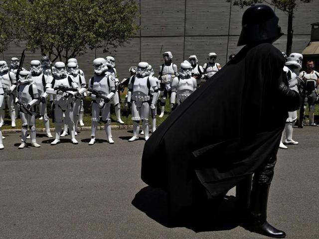People wearing Star Wars costumes at the parade in Metropoli. (REUTERS) People wearing Star Wars costumes at the parade in Metropoli. (REUTERS)