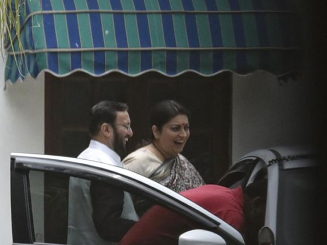 Prakash Javadekar and Smriti Irani in New Delhi on Wednesday.(Arun Sharma/ HT Photo)