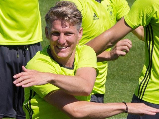 Bastian Schweinsteiger, center, attends the last training session of the German national football team. (AP Photo) Bastian Schweinsteiger, center, attends the last training session of the German national football team. (AP Photo)