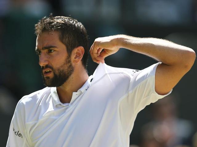 Marin Cilic reacts after a point. (AFP)