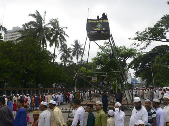 Bangladeshi Muslims wait in a queue for a security check prior to Eid al-Fitr prayers in Dhaka on July 7, 2016. At least two people were killed when suspected militants hurled bombs at security men guarding Eid prayers in Kishoregunj town on Thursday, July 7, 2016. (AFP) Bangladeshi Muslims wait in a queue for a security check prior to Eid al-Fitr prayers in Dhaka on July 7, 2016. At least two people were killed when suspected militants hurled bombs at security men guarding Eid prayers in Kishoregunj town on Thursday, July 7, 2016. (AFP)