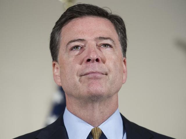 FBI director James Comey makes a statement at FBI headquarters in Washington. (AP) FBI director James Comey makes a statement at FBI headquarters in Washington. (AP)