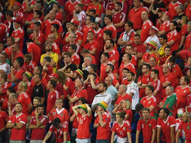 Wales' supporters react at the end of the Euro 2016 semifinal between Portugal and Wales at the Parc Olympique Lyonnais stadium in Décines-Charpieu. (AFP Photo) Wales' supporters react at the end of the Euro 2016 semifinal between Portugal and Wales at the Parc Olympique Lyonnais stadium in Décines-Charpieu. (AFP Photo)