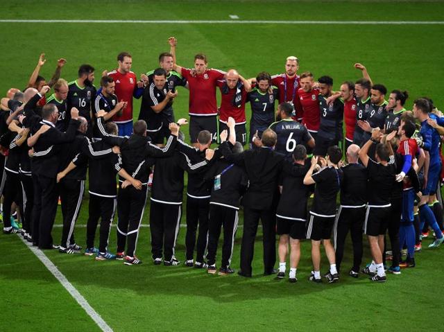 Wales' players stand together after the Euro 2016 semifinal football match between Portugal and Wales at the Parc Olympique Lyonnais stadium. (AFP) Wales' players stand together after the Euro 2016 semifinal football match between Portugal and Wales at the Parc Olympique Lyonnais stadium. (AFP)