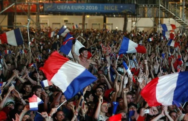 France fans react in the fan zone during the France v Iceland EURO 2016 quarter final match. (Reuters Photo) France fans react in the fan zone during the France v Iceland EURO 2016 quarter final match. (Reuters Photo)