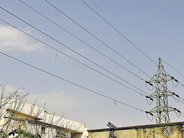 With the high-voltage cables going underground, chances of electrocution in colonies and other slum areas where these pass close to low terraces will also reduce. (HT Photo) With the high-voltage cables going underground, chances of electrocution in colonies and other slum areas where these pass close to low terraces will also reduce. (HT Photo)