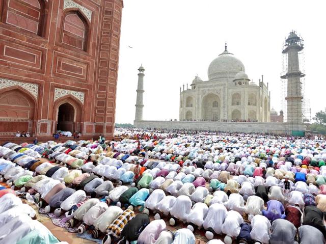 Muslims attend Eid al-Fitr prayers to mark the end of the holy fasting month of Ramadan, at the Taj Mahal mosque. (Pawan Kumar/REUTERS)