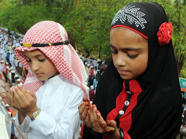 Dressed to the nines: Children, dressed in Eid finery, offering the naamaz in Patiala on Thursday. (Bharat Bhushan/HT Photo)