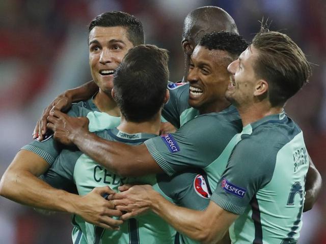 Portugal's Nani celebrates with Cristiano Ronaldo after scoring their second goal.(Reuters Photo)