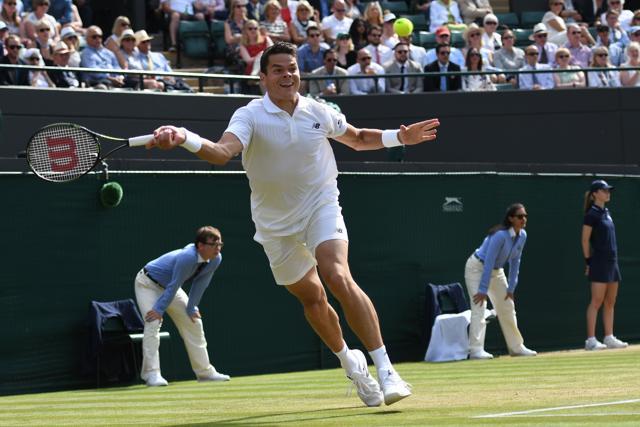 Canada's Milos Raonic returns to US player Sam Querrey during their men's singles quarterfinal match. (AFP Photo) Canada's Milos Raonic returns to US player Sam Querrey during their men's singles quarterfinal match. (AFP Photo)