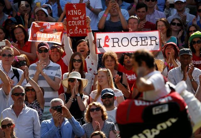 Roger Federer fans celebrate after he won the match against Croatia's Marin Cilic. (Reuters Photo)