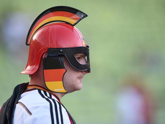 A German supporter attends the public screening of the Euro 2016 semifinal football match at the Olympic stadium in Munich, southern Germany. (AFP Photo) A German supporter attends the public screening of the Euro 2016 semifinal football match at the Olympic stadium in Munich, southern Germany. (AFP Photo)