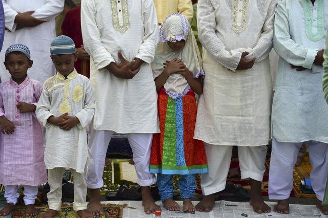 Bangladeshi Muslims offer Eid ul-Fitr prayers in Dhaka on Thursday. (AFP) Bangladeshi Muslims offer Eid ul-Fitr prayers in Dhaka on Thursday. (AFP)
