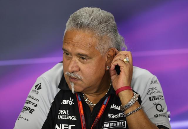 Industrialist Vijay Mallya interacts with journalists during a press conference in UK. (REUTERS) Industrialist Vijay Mallya interacts with journalists during a press conference in UK. (REUTERS)