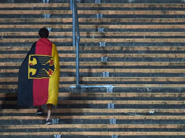 A German supporter leaves the stadium after the Euro 2016 semifinal football match, at the Olympic stadium in Munich, southern Germany. (AFP Photo) A German supporter leaves the stadium after the Euro 2016 semifinal football match, at the Olympic stadium in Munich, southern Germany. (AFP Photo)