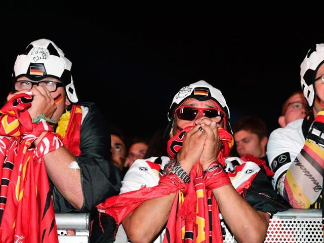 Germany supporters react during the Euro 2016 semifinal football match against France at the public screening at the "Fan Mile" in Berlin. (AFP Photo) Germany supporters react during the Euro 2016 semifinal football match against France at the public screening at the "Fan Mile" in Berlin. (AFP Photo)