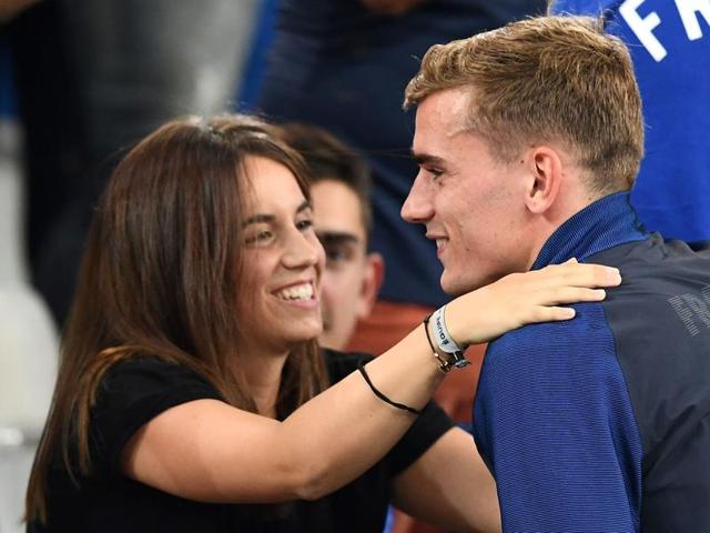 France's forward Antoine Griezmann hugs his girlfriend Erika Choperena as he celebrates the team's 2-0 win over Germany in the Euro 2016 semifinal football match against Germany. (AFP Photo) France's forward Antoine Griezmann hugs his girlfriend Erika Choperena as he celebrates the team's 2-0 win over Germany in the Euro 2016 semifinal football match against Germany. (AFP Photo)
