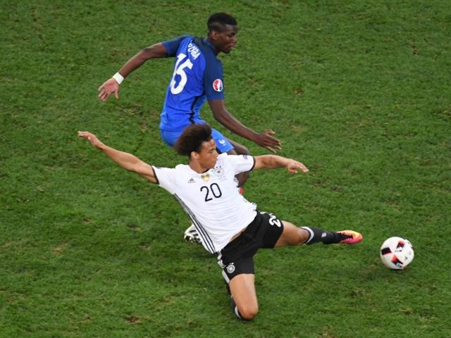 Germany's midfielder Leroy Sane (front) vies for the ball with France's midfielder Paul Pogba. (AFP Photo) Germany's midfielder Leroy Sane (front) vies for the ball with France's midfielder Paul Pogba. (AFP Photo)