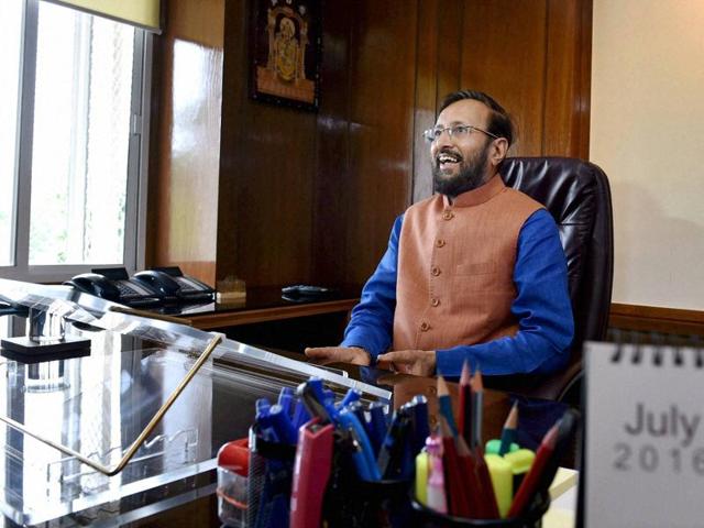 New HRD minister Prakash Javadekar takes charge of his office in New Delhi.(PTI Photo)