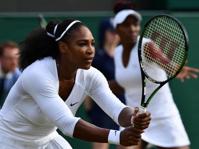 Serena Williams (left) and Venus Williams (right) play against Russia's Ekaterina Makarova and Elena Vesnina during their women's doubles quarterfinal match on the eleventh day of the 2016 Wimbledon Championships at The All England Lawn Tennis Club in Wimbledon. (AFP Photo) Serena Williams (left) and Venus Williams (right) play against Russia's Ekaterina Makarova and Elena Vesnina during their women's doubles quarterfinal match on the eleventh day of the 2016 Wimbledon Championships at The All England Lawn Tennis Club in Wimbledon. (AFP Photo)