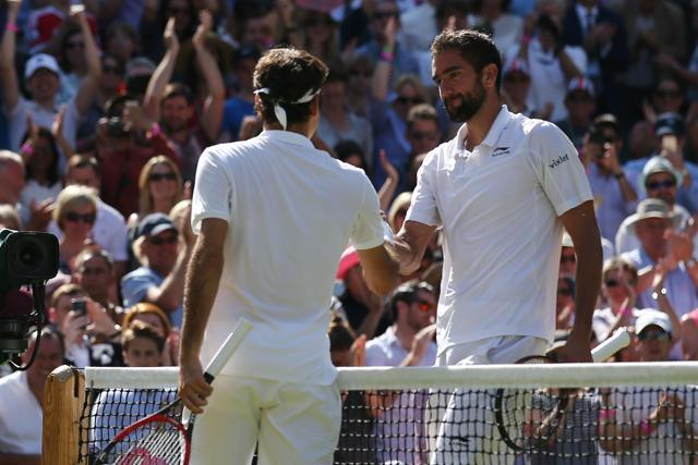 Switzerland's Roger Federer (left) shakes hands with Croatia's Marin Cilic (right) after Federer won their men's singles quarterfinal match on the tenth day of the 2016 Wimbledon Championships. (AFP Photo) Switzerland's Roger Federer (left) shakes hands with Croatia's Marin Cilic (right) after Federer won their men's singles quarterfinal match on the tenth day of the 2016 Wimbledon Championships. (AFP Photo)