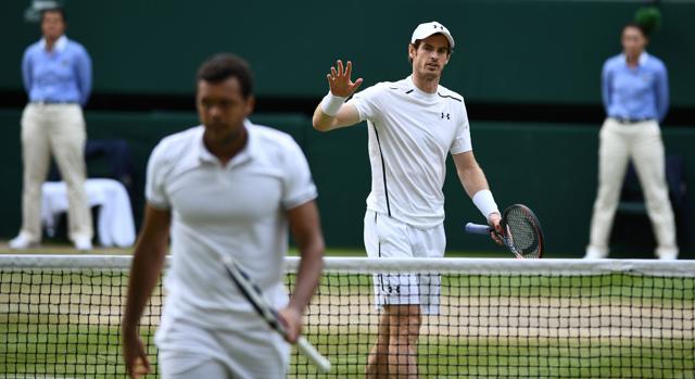 Britain's Andy Murray reacts while playing against France's Jo-Wilfried Tsonga during their men's singles quarterfinal match. (AFP Photo) Britain's Andy Murray reacts while playing against France's Jo-Wilfried Tsonga during their men's singles quarterfinal match. (AFP Photo)