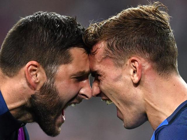 France's forward Andre-Pierre Gignac (left) celebrates with Antoine Griezmann after scoring the second goal for France during the Euro 2016 semifinal football match between Germany and France at the Stade Velodrome in Marseille. (AFP Photo) France's forward Andre-Pierre Gignac (left) celebrates with Antoine Griezmann after scoring the second goal for France during the Euro 2016 semifinal football match between Germany and France at the Stade Velodrome in Marseille. (AFP Photo)