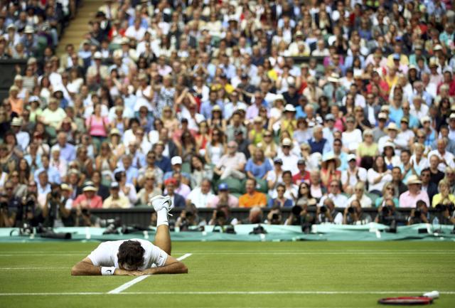 Federer took a tumble early in the fifth set, following which his serve was broken. (REUTERS) Federer took a tumble early in the fifth set, following which his serve was broken. (REUTERS)
