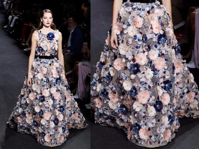 Elie Saab: The Lebanese designer presented long, floaty dresses embellished with embroidery. Details such as beads, gemstones, fur and feathers were used all together in couture creations, for a luxurious, opulent effect. (AFP) Elie Saab: The Lebanese designer presented long, floaty dresses embellished with embroidery. Details such as beads, gemstones, fur and feathers were used all together in couture creations, for a luxurious, opulent effect. (AFP)