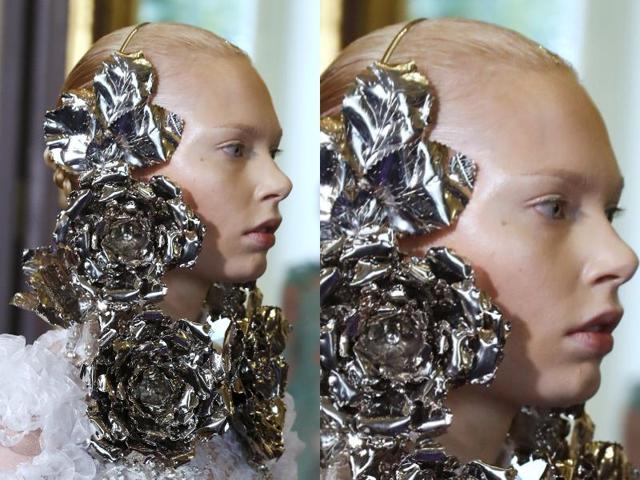 Francesco Scognamiglio: The label stood out with its striking silver body jewelry, planting oversized roses on either side of the face. (AFP) Francesco Scognamiglio: The label stood out with its striking silver body jewelry, planting oversized roses on either side of the face. (AFP)