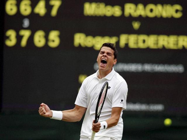 Milos Raonic of Canada celebrates after beating Roger Federer of Switzerland in their men's semifinal. (AP Photo) 