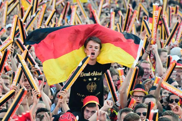 Germany’s supporters follow the Euro 2016 semifinal football match Germany vs France during the public screening at the "Fan Mile" in Berlin. (AFP Photo) Germany’s supporters follow the Euro 2016 semifinal football match Germany vs France during the public screening at the "Fan Mile" in Berlin. (AFP Photo)