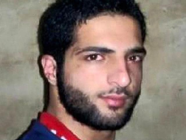 A file photo of Hizbul Mujahideen commander Burhan Wani, who was killed in an encounter in Anantnag district of south Kashmir on Friday.(PTI) A file photo of Hizbul Mujahideen commander Burhan Wani, who was killed in an encounter in Anantnag district of south Kashmir on Friday.(PTI)
