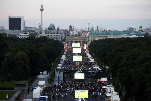 Fans of Germany watch the Euro 2016 quarterfinal between Germany and Italy at a public screening of the match in Berlin. (Reuters Photo) Fans of Germany watch the Euro 2016 quarterfinal between Germany and Italy at a public screening of the match in Berlin. (Reuters Photo)